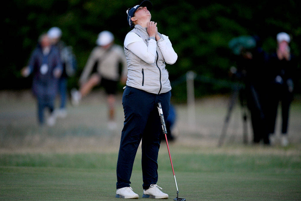 Ashleigh Buhai of South Africa celebrates after her putt shot on the 18th hole in the third Play Off for winning the AIG Women